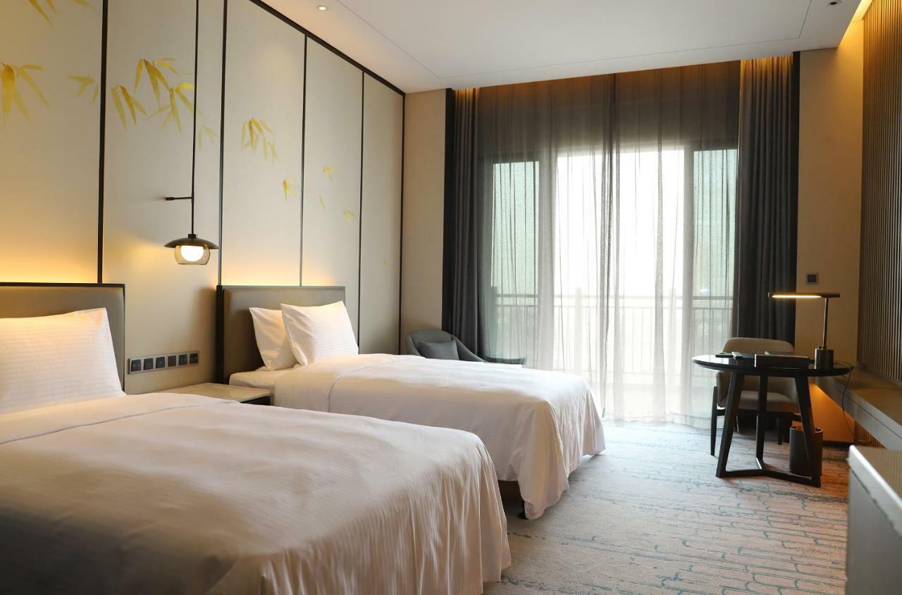 Wanda Realm Wuxi Hotel Esterno foto