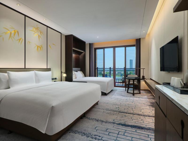 Wanda Realm Wuxi Hotel Esterno foto
